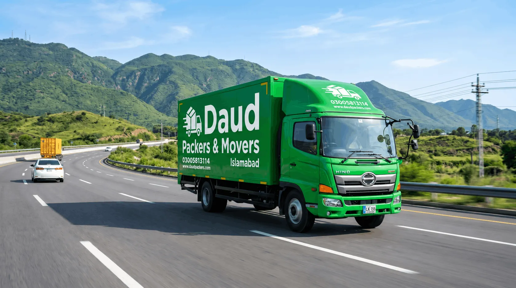 Daud Packers & Movers green truck traveling for intercity moving services from Islamabad